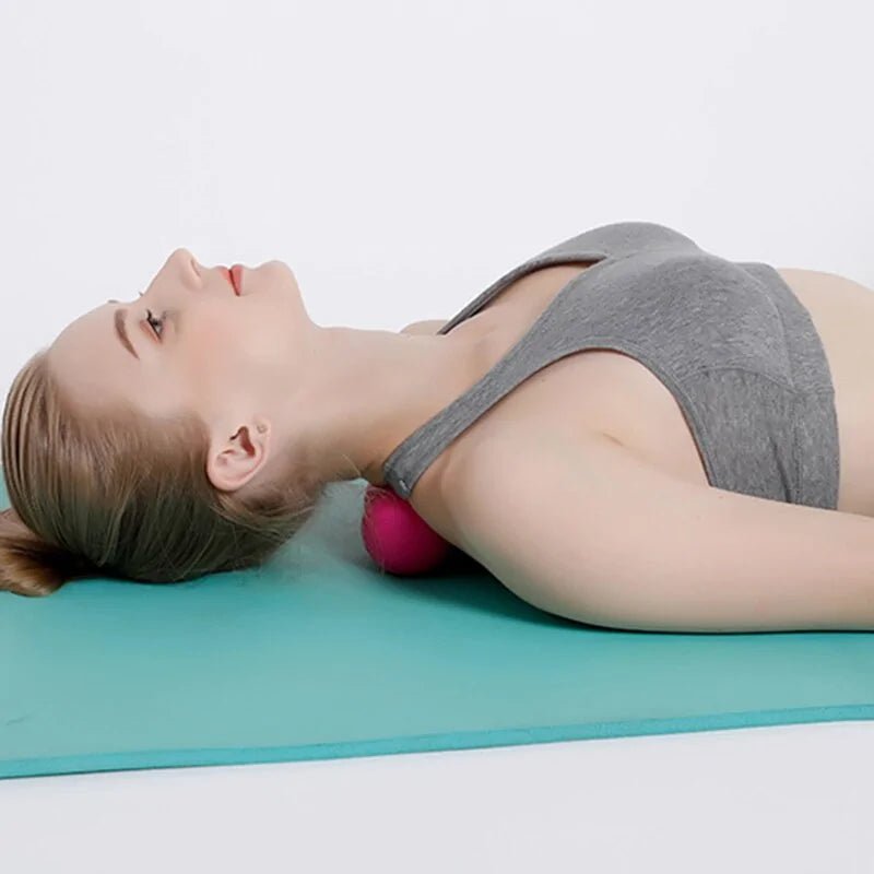Massage Fitness Ball designed for on-the-go relaxation and wellness. Ideal for self-massage, post-exercise recovery, and back relief, it boosts circulation, aids recovery, and targets areas for weight management. Portable and versatile, perfect for home, office, or travel.- TNT Fitness Gear