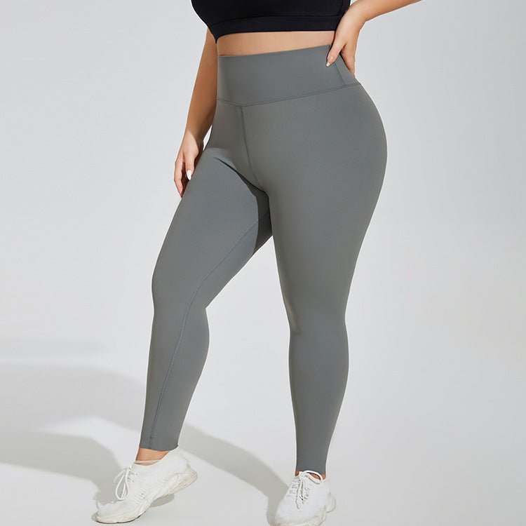 Plus-size seamless high-waist yoga pants in Waxon Green, Monet Purple, and Quiet Black, featuring quick-drying fabric and a hip-lifting design for comfort and style. - TNT Fitness Gear