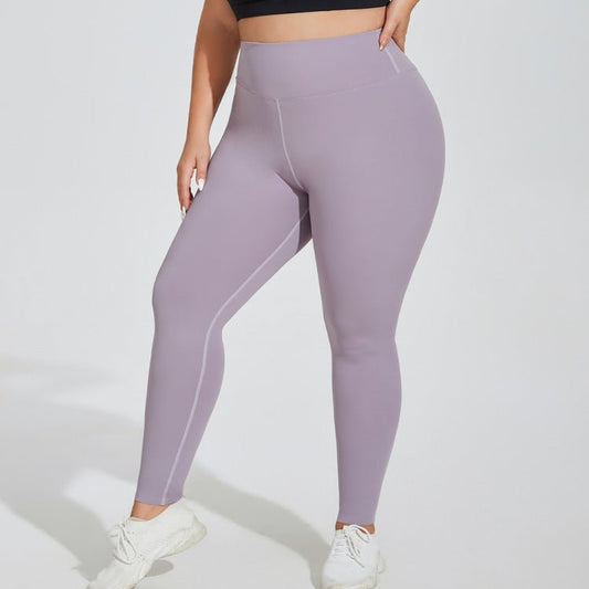 Plus-size seamless high-waist yoga pants in Waxon Green, Monet Purple, and Quiet Black, featuring quick-drying fabric and a hip-lifting design for comfort and style. - TNT Fitness Gear