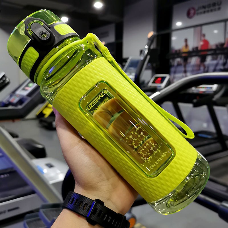 Portable sport water bottles made from durable copolymer polyester plastic, designed for active lifestyles. Lightweight and reliable with a temperature range of -10°C to 96°C, available in stylish colors and sizes (350ml, 450ml, 700ml, 950ml). Features include a leak-proof cap and easy spout for effortless hydration during any adventure. - TNT Fitness