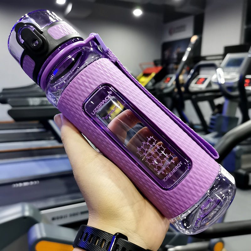 Portable sport water bottles made from durable copolymer polyester plastic, designed for active lifestyles. Lightweight and reliable with a temperature range of -10°C to 96°C, available in stylish colors and sizes (350ml, 450ml, 700ml, 950ml). Features include a leak-proof cap and easy spout for effortless hydration during any adventure. - TNT Fitness