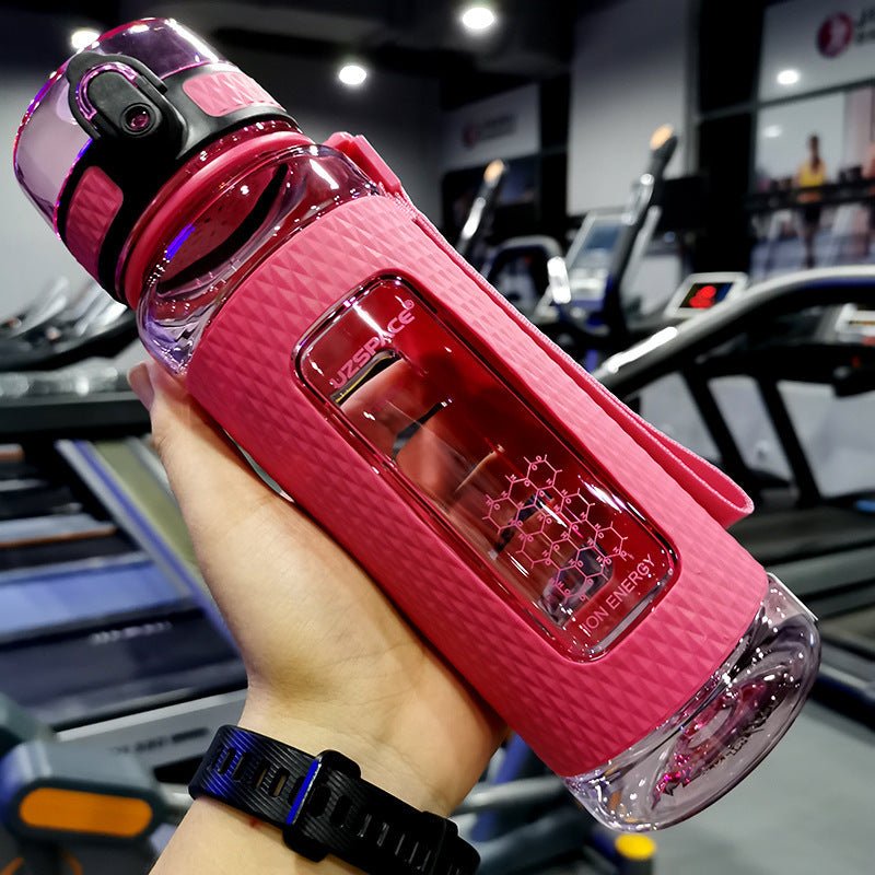 Portable sport water bottles made from durable copolymer polyester plastic, designed for active lifestyles. Lightweight and reliable with a temperature range of -10°C to 96°C, available in stylish colors and sizes (350ml, 450ml, 700ml, 950ml). Features include a leak-proof cap and easy spout for effortless hydration during any adventure. - TNT Fitness