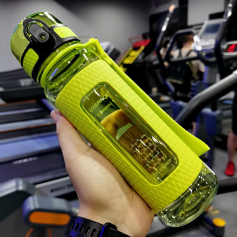 Portable sport water bottles made from durable copolymer polyester plastic, designed for active lifestyles. Lightweight and reliable with a temperature range of -10°C to 96°C, available in stylish colors and sizes (350ml, 450ml, 700ml, 950ml). Features include a leak-proof cap and easy spout for effortless hydration during any adventure. - TNT Fitness
