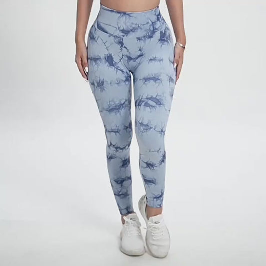 Video demonstration of the Women's Seamless Push-Up Tie-Dye Yoga Leggings, showcasing their snug, flexible fit and how they contour to your curves. See the vibrant tie-dye design and seamless construction in action, delivering comfort and style for yoga, workouts, or casual wear  TNT Fitness Gear