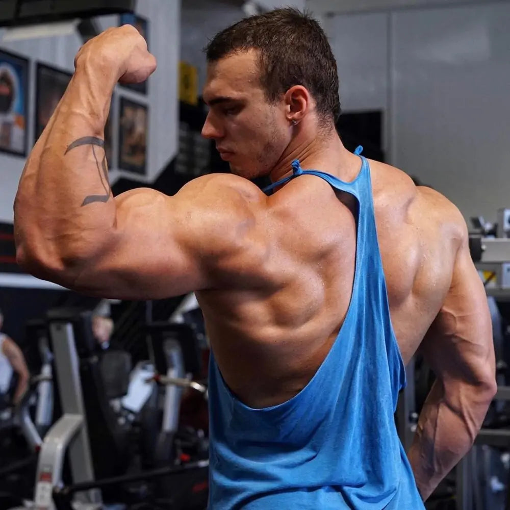 Men's Athletic Y-Back 'IRON' Printed Gym Muscle Shirt – Bodybuilding Tank Top: Lightweight and breathable tank top featuring a bold 'IRON' print, Y-back design, and thin shoulder straps for enhanced mobility and comfort during workouts or casual wear - TNT Fitness Gear