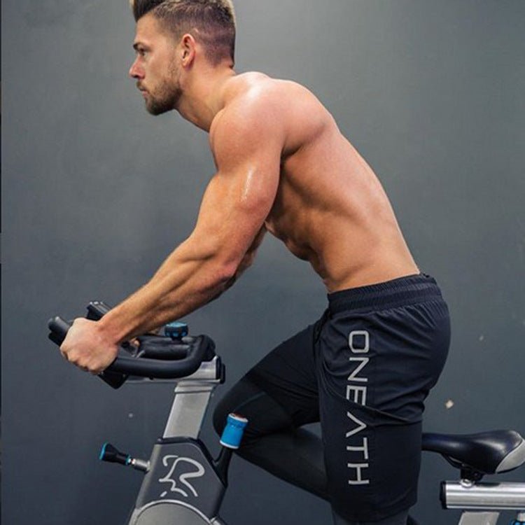 Men's gym shorts with an elastic waistband, perfect for running and workouts. Comfortable and versatile by TNT Fitness Gear