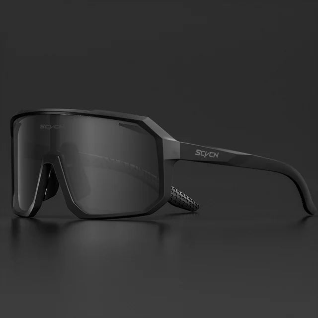 SCVCN Cycling Sunglasses with photochromic lenses that adapt to changing light conditions. Offers 100% UV protection, lightweight durability, and an ergonomic fit for long rides. Perfect for cycling, hiking, running, and other outdoor activities, combining style and functionality- TNT Fitness Gear