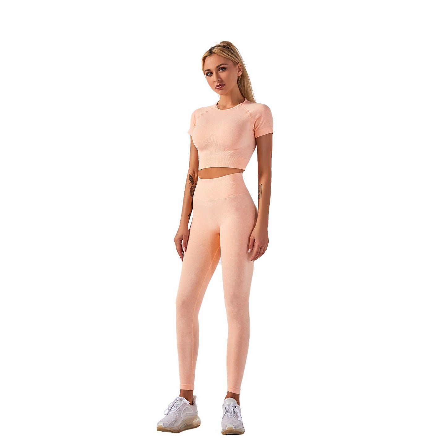 Women's seamless yoga set with short-sleeve top & trousers, in breathable nylon-spandex. Solid colors: hemp grey, pink, sky blue, orange, green, purple & red. By TNT Fitness Gear. Perfect for workouts