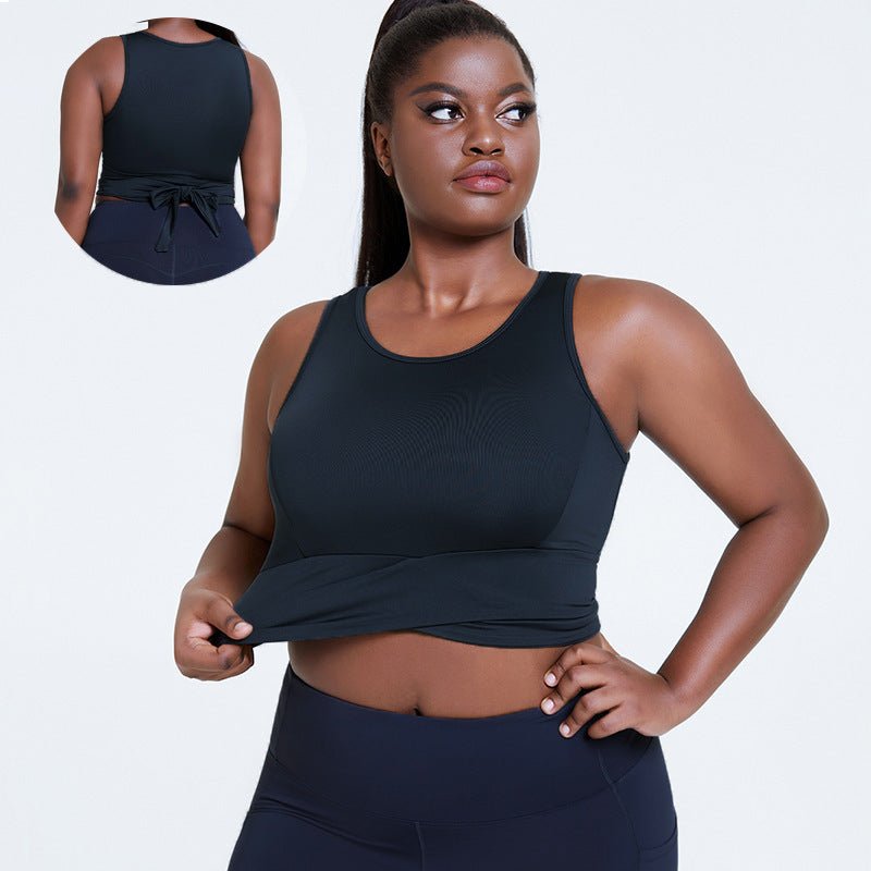 Breathable plus-size shockproof gym top with supportive chest pad design, adjustable straps, and stylish dark gray finish, perfect for yoga and fitness.- TNT Fitness Gear