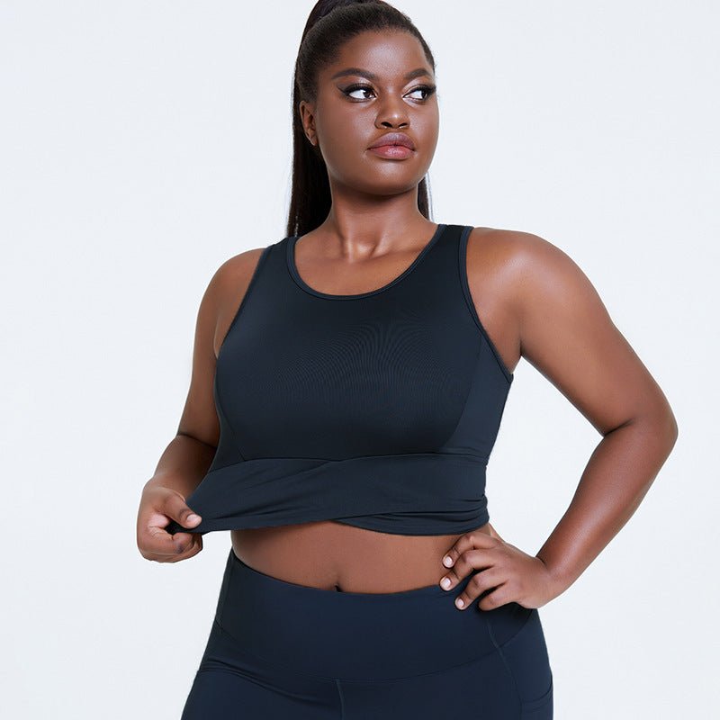 Breathable plus-size shockproof gym top with supportive chest pad design, adjustable straps, and stylish dark gray finish, perfect for yoga and fitness.- TNT Fitness Gear