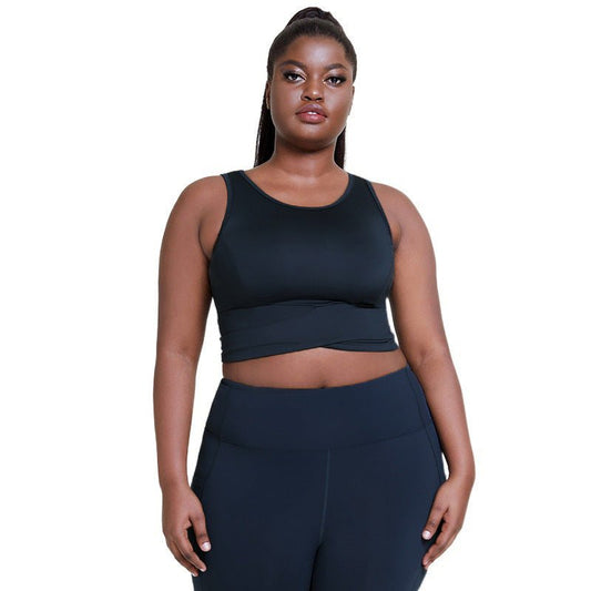 Breathable plus-size shockproof gym top with supportive chest pad design, adjustable straps, and stylish dark gray finish, perfect for yoga and fitness.- TNT Fitness Gear
