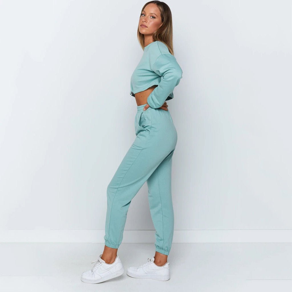 Women's sports & leisure suit with jacket & pants for workouts or casual wear. Stylish, functional & available in colors/sizes. By TNT Fitness Gear
