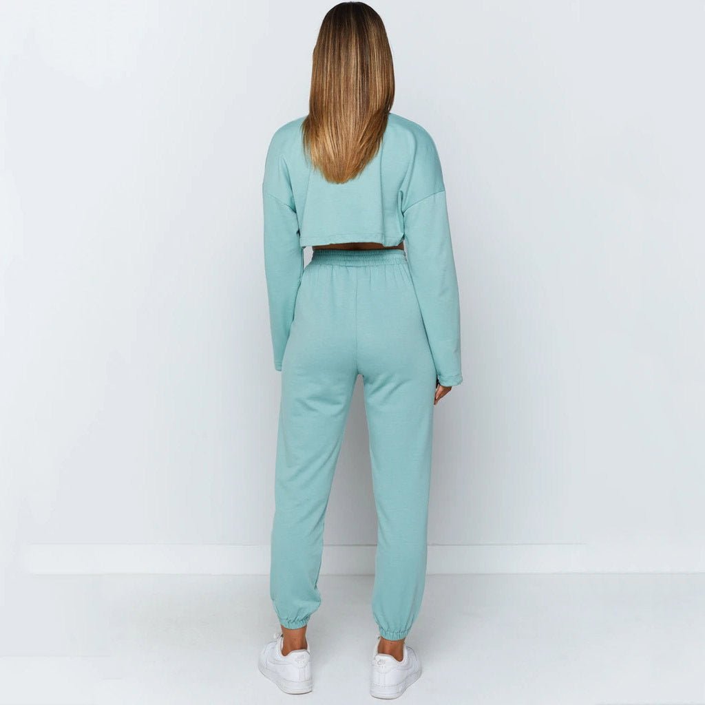 Women's sports & leisure suit with jacket & pants for workouts or casual wear. Stylish, functional & available in colors/sizes. By TNT Fitness Gear