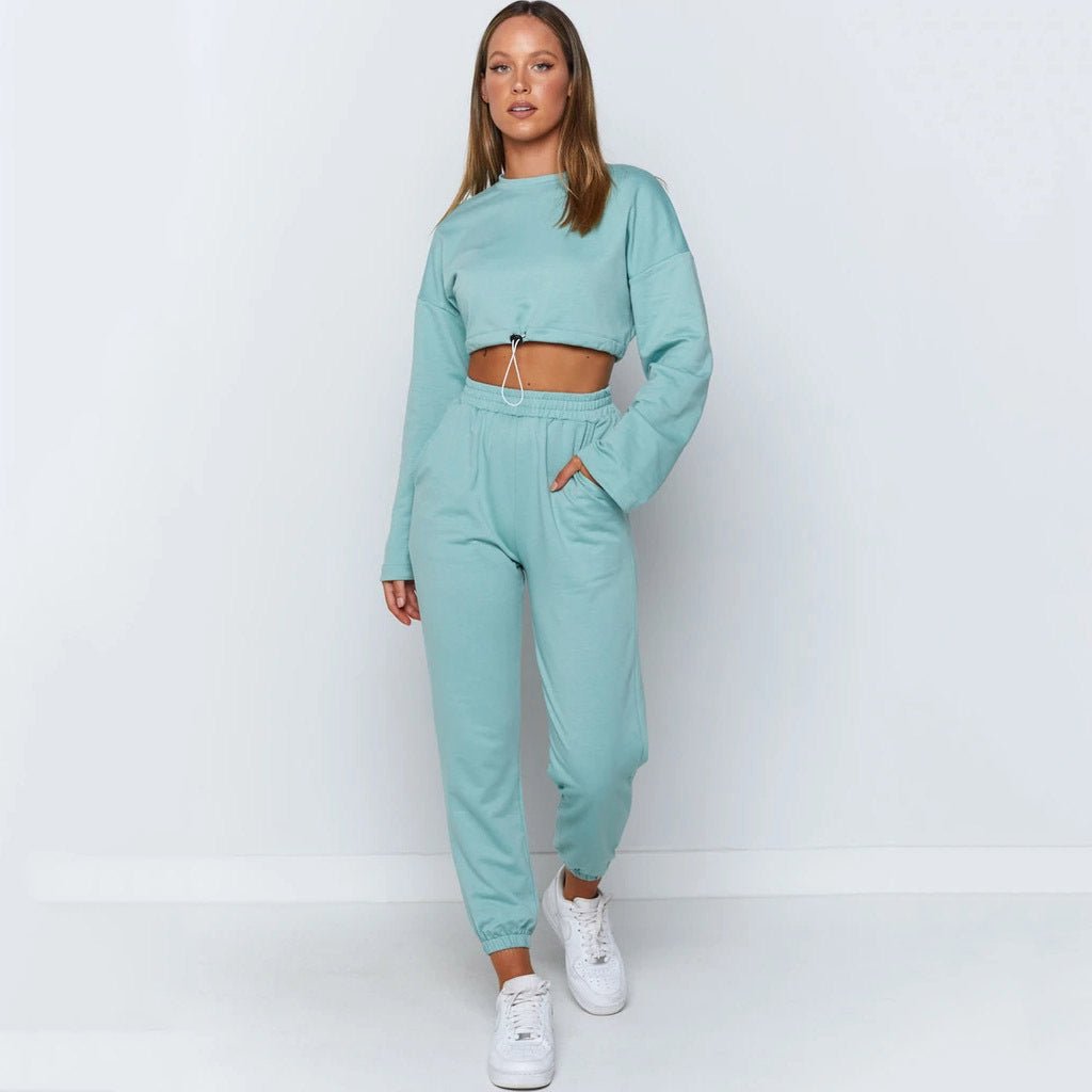 Women's sports & leisure suit with jacket & pants for workouts or casual wear. Stylish, functional & available in colors/sizes. By TNT Fitness Gear