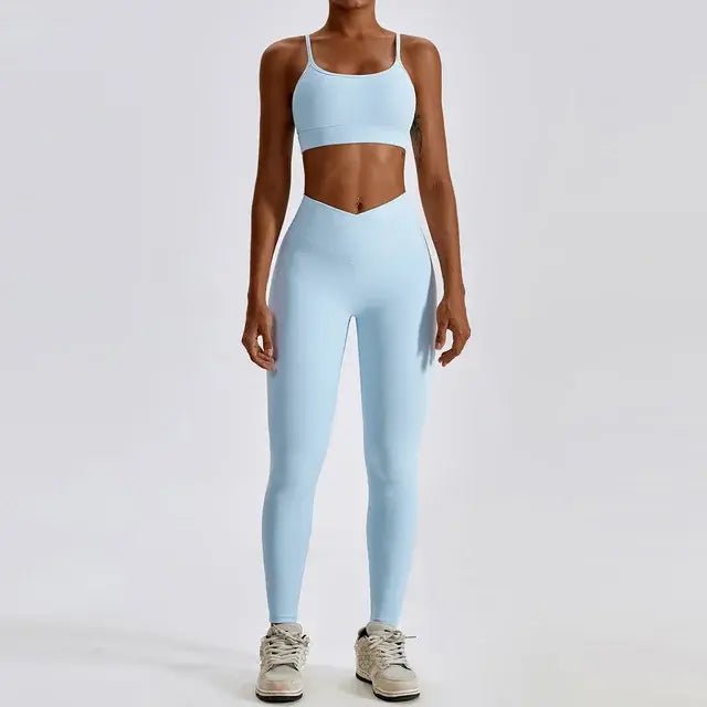Stylish and comfortable women's two-piece fitness gym wear set featuring a matching sports bra and high-waisted leggings. Ideal for workouts, yoga, and casual wear, made from stretchy, moisture-wicking fabric
