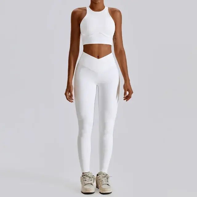 Stylish and comfortable women's two-piece fitness gym wear set featuring a matching sports bra and high-waisted leggings. Ideal for workouts, yoga, and casual wear, made from stretchy, moisture-wicking fabric
