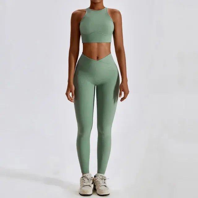 Stylish and comfortable women's two-piece fitness gym wear set featuring a matching sports bra and high-waisted leggings. Ideal for workouts, yoga, and casual wear, made from stretchy, moisture-wicking fabric