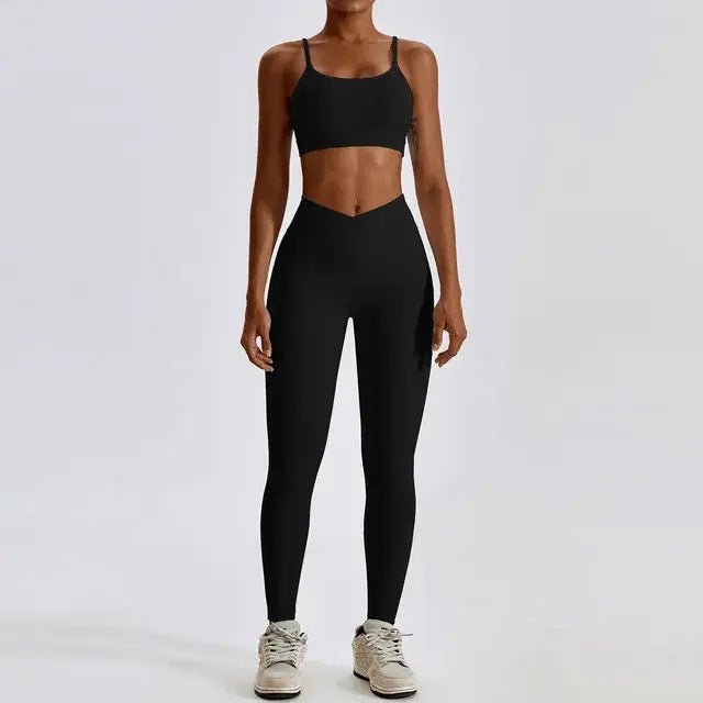 Stylish and comfortable women's two-piece fitness gym wear set featuring a matching sports bra and high-waisted leggings. Ideal for workouts, yoga, and casual wear, made from stretchy, moisture-wicking fabric