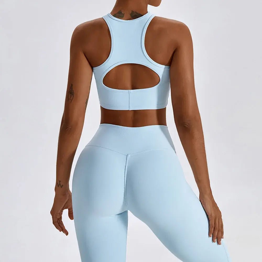 Stylish and comfortable women's two-piece fitness gym wear set featuring a matching sports bra and high-waisted leggings. Ideal for workouts, yoga, and casual wear, made from stretchy, moisture-wicking fabric