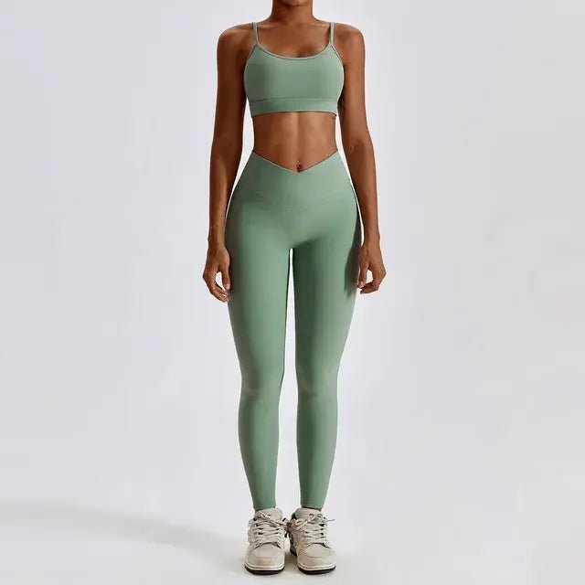 Stylish and comfortable women's two-piece fitness gym wear set featuring a matching sports bra and high-waisted leggings. Ideal for workouts, yoga, and casual wear, made from stretchy, moisture-wicking fabric