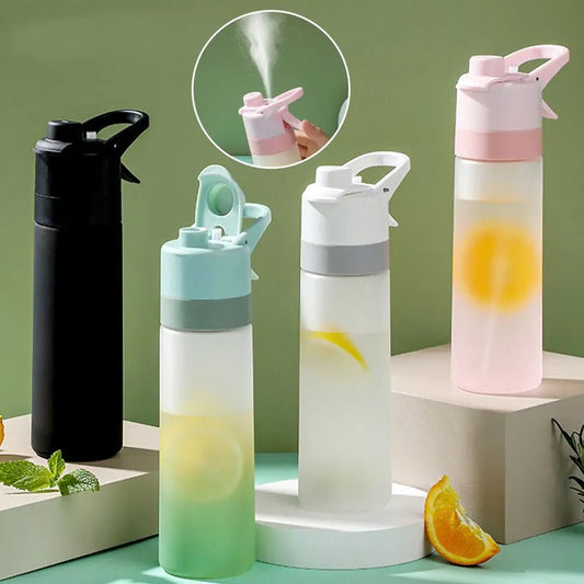 Large spray water bottle with a built-in misting function, perfect for staying cool and hydrated during outdoor activities, workouts, or hot weather. Lightweight and durable for everyday use - TNT Fitness