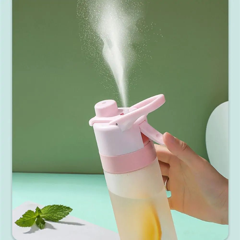 Large spray water bottle with a built-in misting function, perfect for staying cool and hydrated during outdoor activities, workouts, or hot weather. Lightweight and durable for everyday use - TNT Fitness
