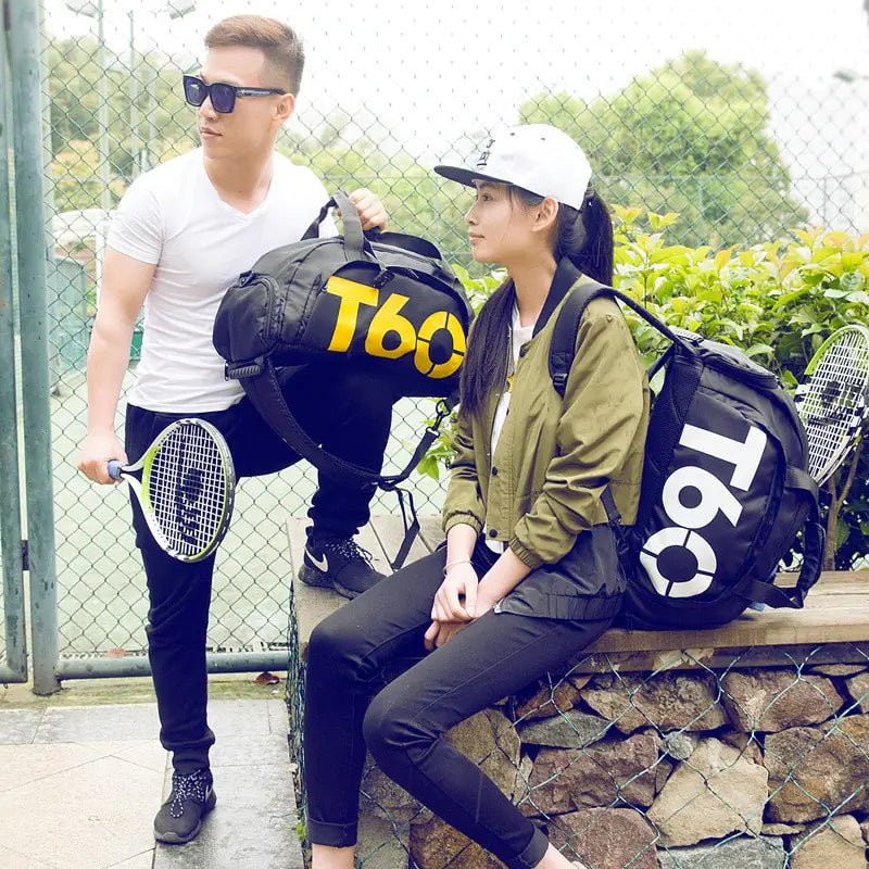 A stylish waterproof Training bag with a sleek design, featuring a separate shoe pocket, adjustable strap, and spacious compartments for travel and fitness essentials.- TNT Fitness Gear
