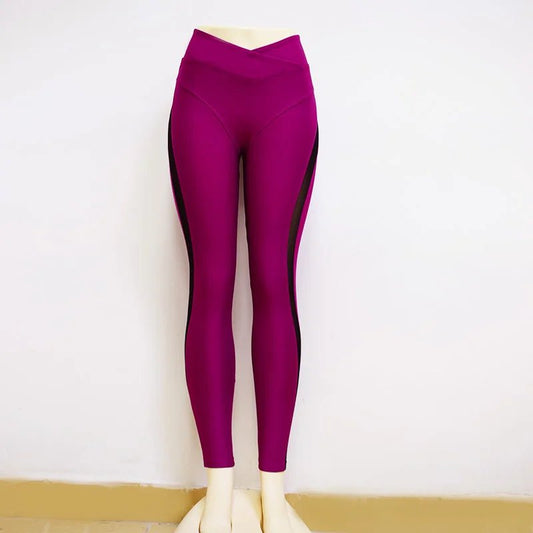 Woman wearing contour high-waisted training leggings during workout