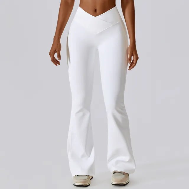 Flared fitness pants for women, designed for gym workouts and yoga. Made with stretchy, breathable material for comfort and freedom of movement. Features a flattering flared silhouette, ideal for both active and casual wear - TNT Fitness Gear