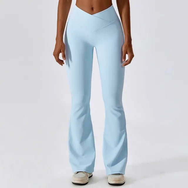 Flared fitness pants for women, designed for gym workouts and yoga. Made with stretchy, breathable material for comfort and freedom of movement. Features a flattering flared silhouette, ideal for both active and casual wear - TNT Fitness Gear