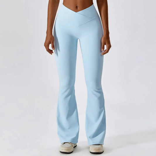 Flared fitness pants for women, designed for gym workouts and yoga. Made with stretchy, breathable material for comfort and freedom of movement. Features a flattering flared silhouette, ideal for both active and casual wear - TNT Fitness Gear