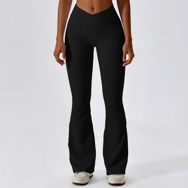 Flared fitness pants for women, designed for gym workouts and yoga. Made with stretchy, breathable material for comfort and freedom of movement. Features a flattering flared silhouette, ideal for both active and casual wear - TNT Fitness Gear