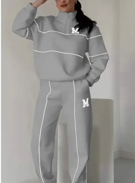 Women's 2-piece lounge set with pullover sweatshirt and sweatpants. Comfortable, stylish, and pocketed by TNT Fitness Gear