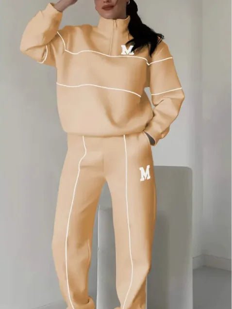 Women's 2-piece lounge set with pullover sweatshirt and sweatpants. Comfortable, stylish, and pocketed by TNT Fitness Gear