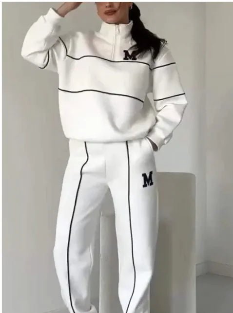 Women's 2-piece lounge set with pullover sweatshirt and sweatpants. Comfortable, stylish, and pocketed by TNT Fitness Gear
