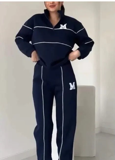 Women's 2-piece lounge set with pullover sweatshirt and sweatpants. Comfortable, stylish, and pocketed by TNT Fitness Gear