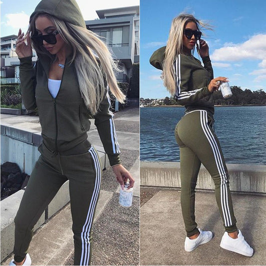 Women's sports and leisure suit featuring a stylish hood, designed for comfort and practicality. The suit showcases a relaxed fit with breathable fabric, complete with a cozy hood for added versatility. Ideal for casual outings, light workouts, or lounging in style - TNT Fitness Gear
