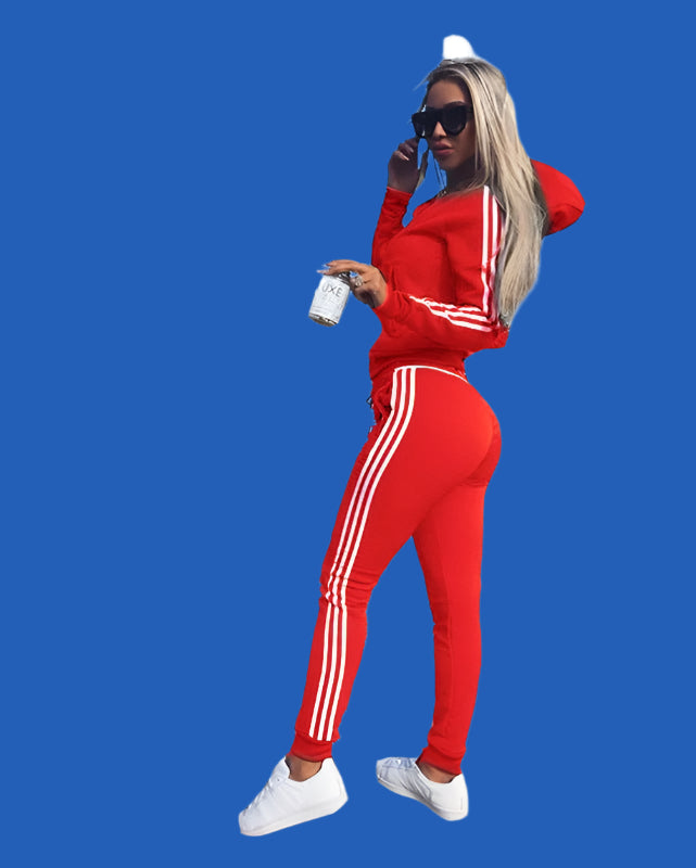 Women's sports and leisure suit featuring a stylish hood, designed for comfort and practicality. The suit showcases a relaxed fit with breathable fabric, complete with a cozy hood for added versatility. Ideal for casual outings, light workouts, or lounging in style - TNT Fitness Gear