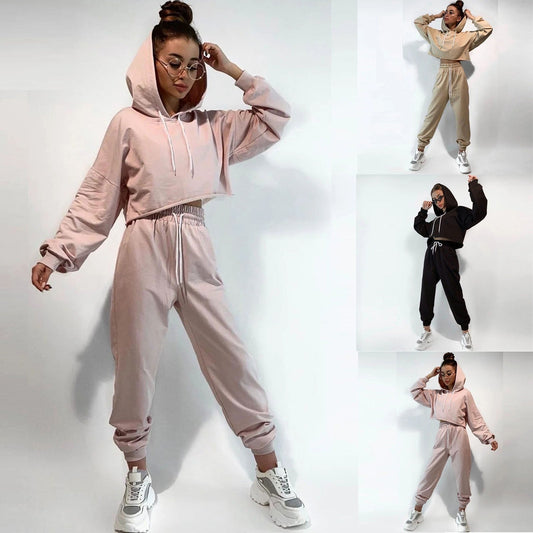 Women's comfortable sports and leisure suits displayed in various neutral and pastel tones, designed for versatility and style. The outfits combine relaxed fits with breathable fabrics, perfect for workouts, casual outings, or lounging. Features include stretchy waistbands, soft-touch materials, and modern cuts to ensure comfort and functionality - TNT Fitness Gear