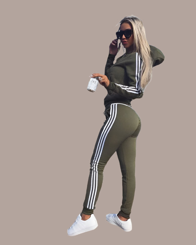 Women's sports and leisure suit featuring a stylish hood, designed for comfort and practicality. The suit showcases a relaxed fit with breathable fabric, complete with a cozy hood for added versatility. Ideal for casual outings, light workouts, or lounging in style - TNT Fitness Gear