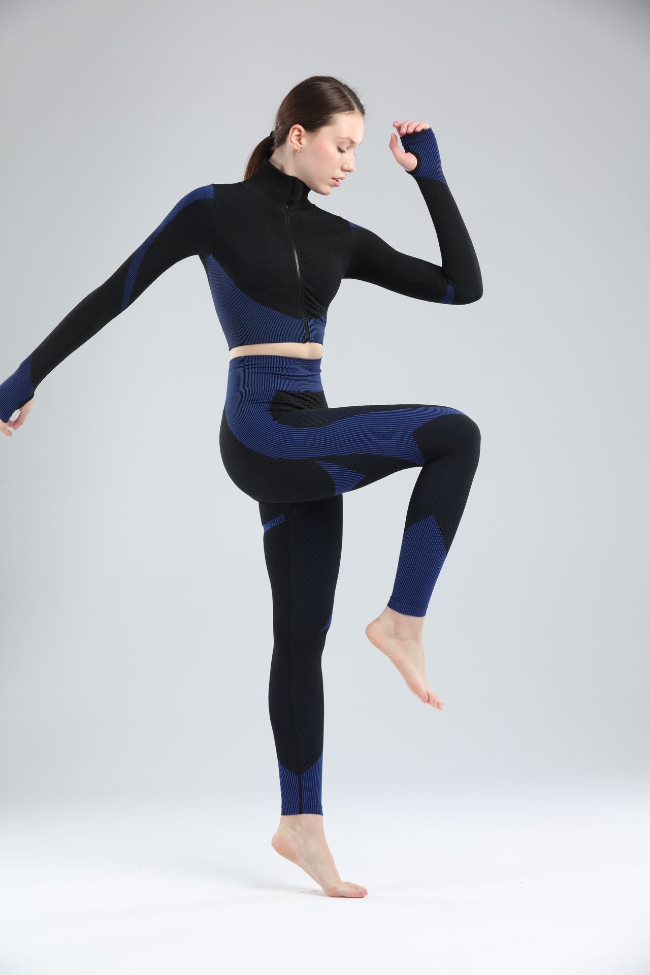 Women's Yoga Gym Suit Set featuring a soft, breathable 85% nylon and 15% spandex blend for ultimate comfort and flexibility. Designed for all seasons, available in chic black-green and orange-pink colors, with tailored sizes from S to L for a stylish, secure fit during workout - TNT Fitness Gear