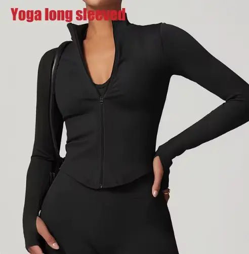 Women's zippered fitness crop top designed for style and functionality. Featuring a sleek zipper detail and a flattering cropped fit, this top is made from breathable, stretchy fabric for comfort and flexibility. Ideal for workouts, yoga, or trendy athleisure wear - TNT Fitness