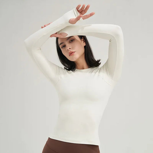 Women's yoga shirt designed for ultimate comfort and style. Made from high-quality, breathable, moisture-wicking fabric, it ensures flexibility and support for yoga and fitness sessions. Featuring a flattering design and vibrant colors, this versatile shirt keeps you cool, confident, and stylish during workouts - TNT Fitness Gear