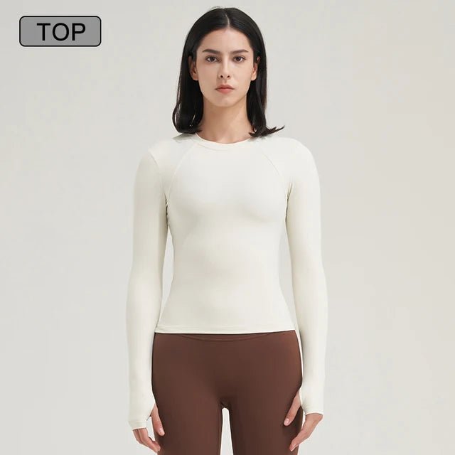 Women's yoga shirt designed for ultimate comfort and style. Made from high-quality, breathable, moisture-wicking fabric, it ensures flexibility and support for yoga and fitness sessions. Featuring a flattering design and vibrant colors, this versatile shirt keeps you cool, confident, and stylish during workouts - TNT Fitness Gear