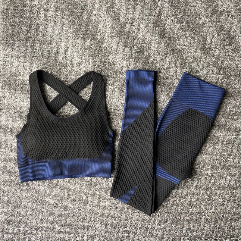 Black and blue women’s sports bra and high waisted leggings set