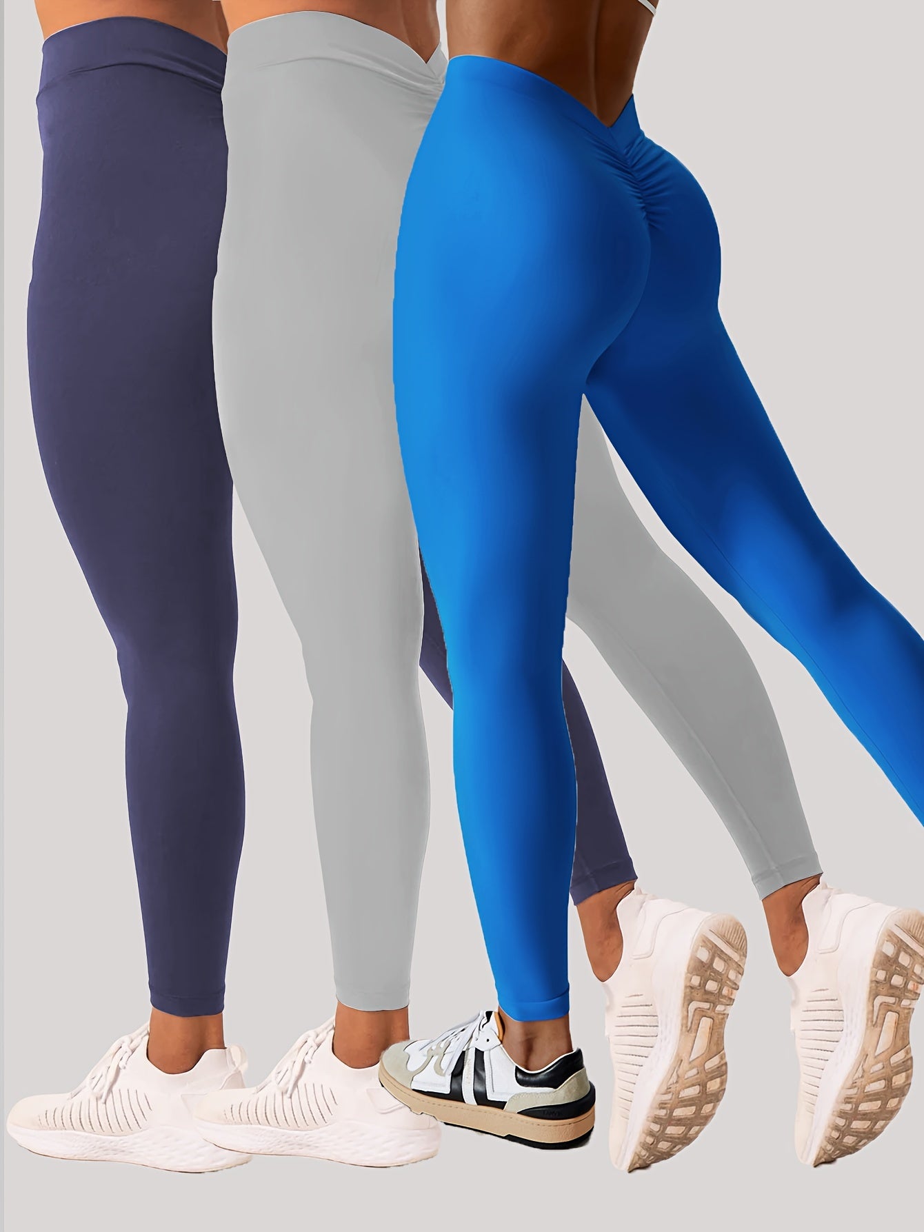 Women wearing high-waisted training leggings designed for workouts and active movement