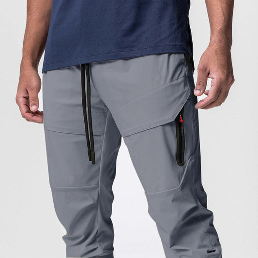 A man wearing the men’s  performance joggers, slim fit gym training pants.