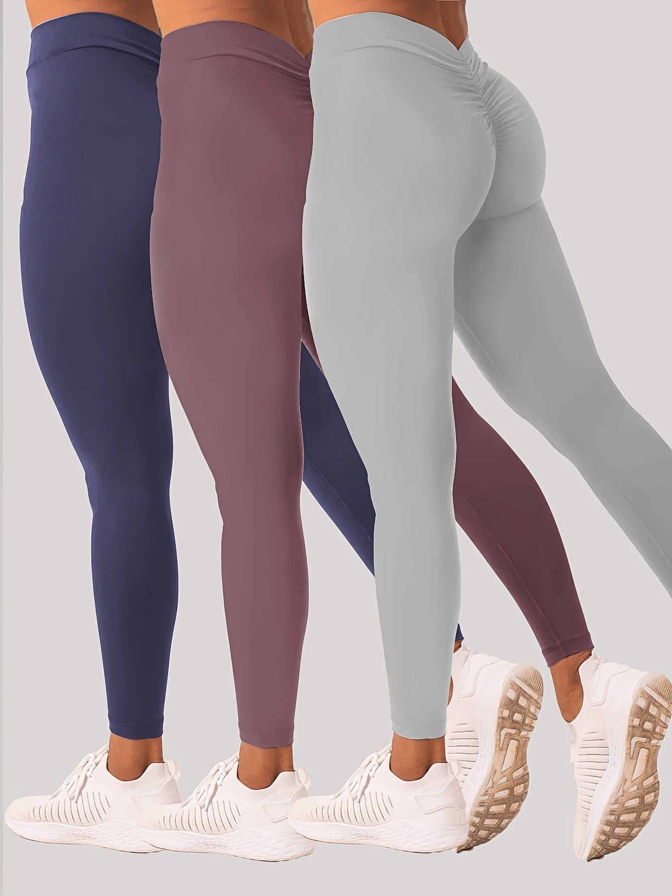 Women wearing high-waisted training leggings designed for workouts and active movement