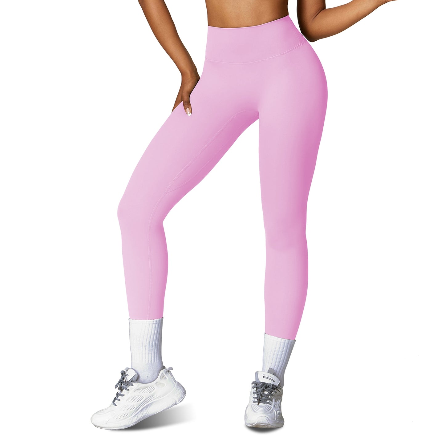 Women wearing high-waisted training leggings designed for workouts and active movement