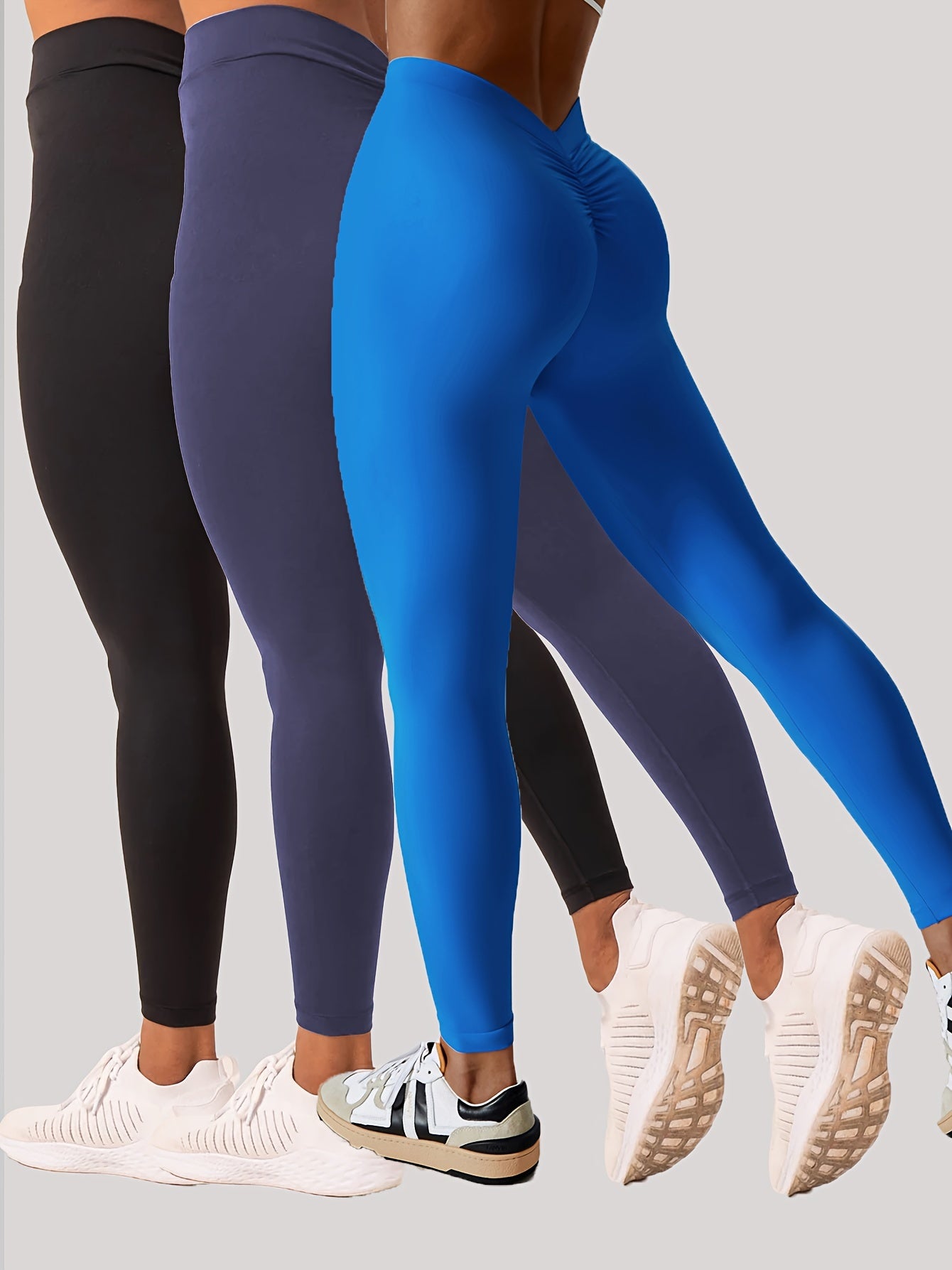 Women wearing high-waisted training leggings designed for workouts and active movement